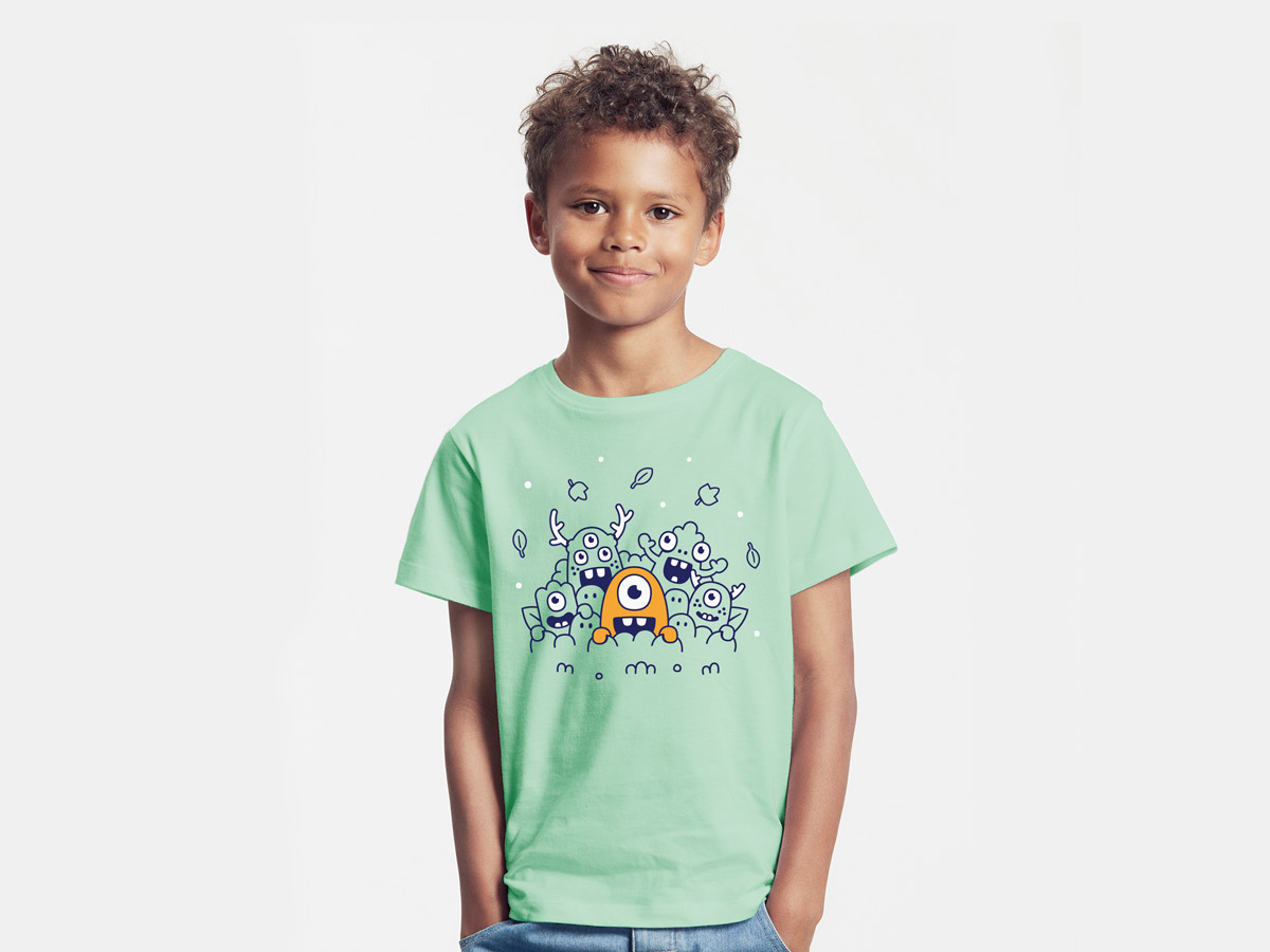 Image of a boy with a Happy Monster Club t-shirt