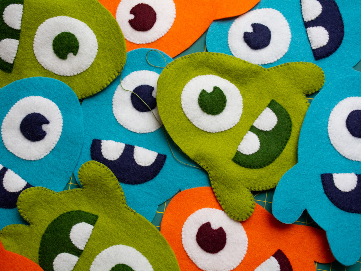 Image of various Happy Monster Club cuddly toys